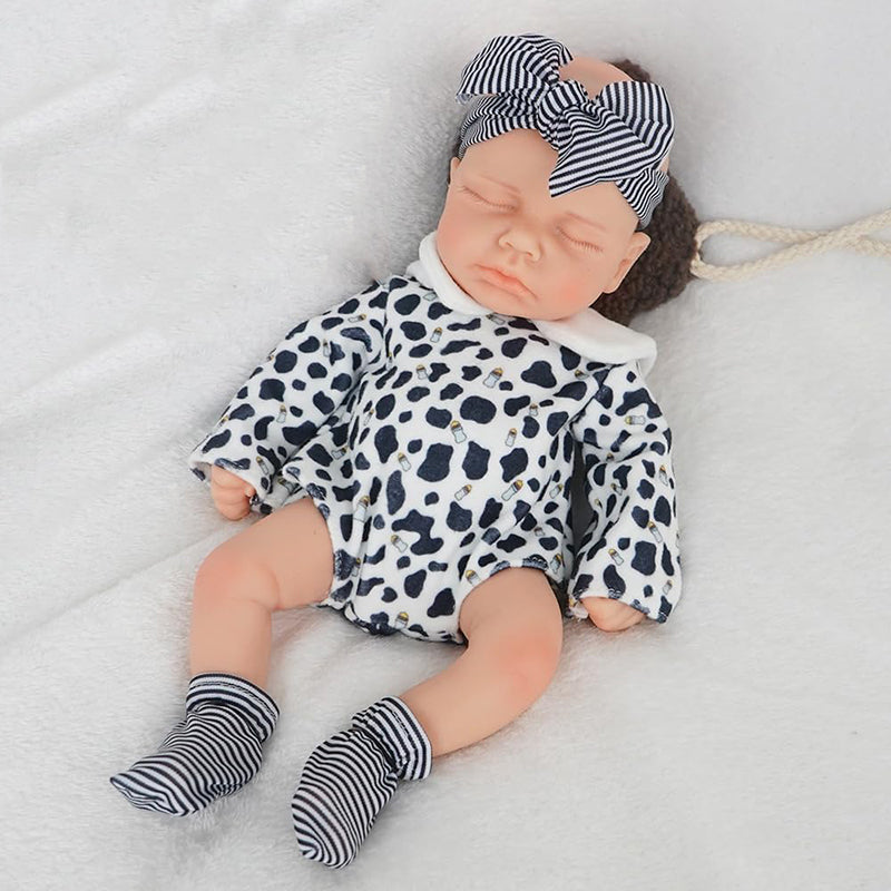 Bambola reborn Loulou in silicone da 30 cm realistica con occhi chiusi in abiti bianchi e neri