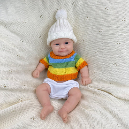 Bambola reborn Maddie Smile da 30cm interamente in silicone con maglione a righe colorate