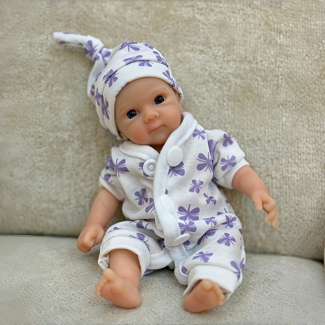 Mini bambola Reborn Bettie in silicone da 20 cm occhi aperti con tutina viola a fiori