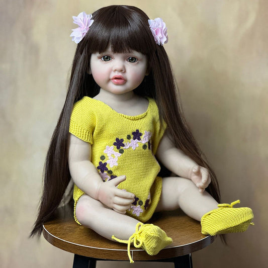 Bambina Reborn con Capelli Lunghi da 55 cm in Abiti Gialli - Betty