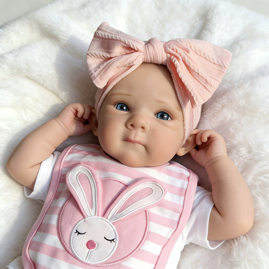 Bambina rinata Bettie realistica da 48 cm con occhi aperti e body bianco