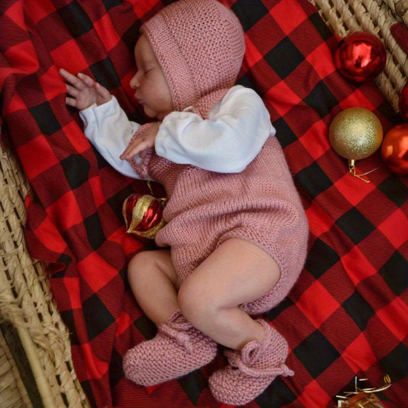 Bambola reborn Laura da 50 cm con corpo morbido e addormentato in maglione rosa
