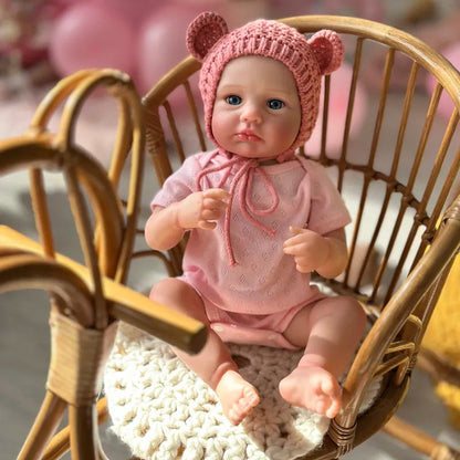 Bambina reborn Loulou da 20 pollici con occhi azzurri e cappello rosa