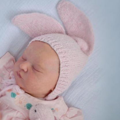 Bambola reborn Laura da 50 cm con corpo morbido e vestito rosa