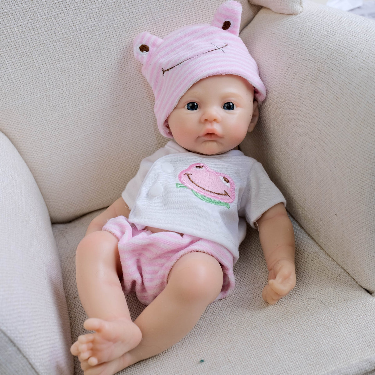 Neonata rinata in morbido silicone con occhi azzurri 30 cm con abiti rosa