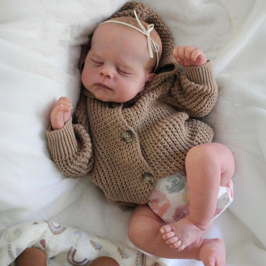 Bambola reborn Erica con corpo morbido e addormentato da 48 cm in maglione marrone