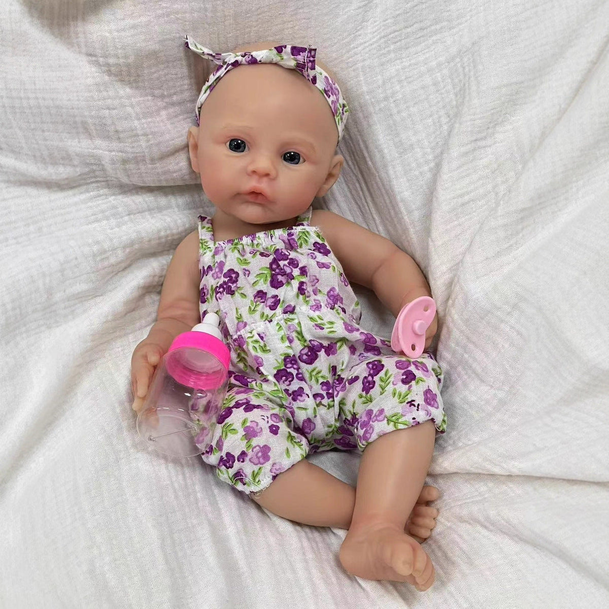 Neonata rinata in morbido silicone con occhi azzurri 30 cm con abito floreale viola - Meadow