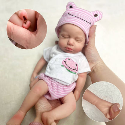 Bambola reborn Loulou addormentata in silicone morbido e realistico da 30 cm