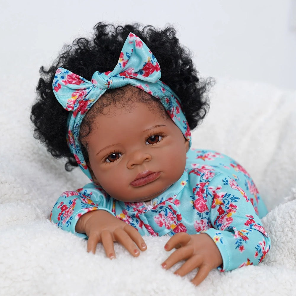 Bambola Reborn Lanny da 20 pollici con pelle scura e capelli ricci