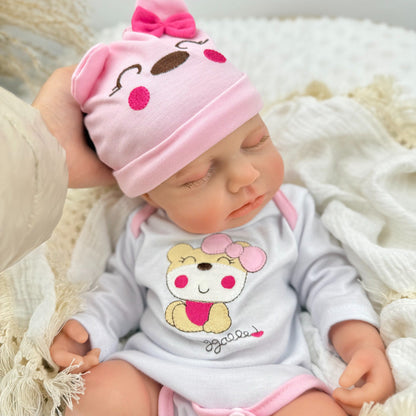 Bambola reborn Loulou alta 45 cm interamente in silicone estensibile con vestitino da orsetto rosa