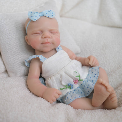 Pascale bambina reborn in silicone da 20 cm con abito blu