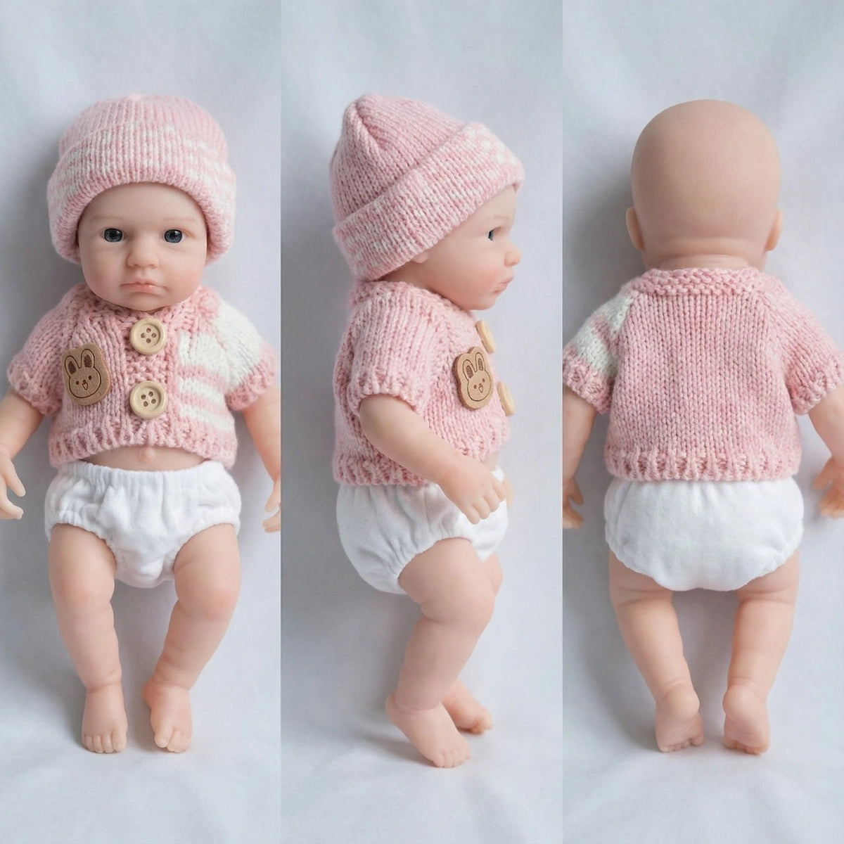 Loulou Bambina rinata in silicone da 20 cm con occhi aperti e maglione rosa