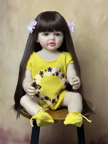 Bambina Reborn con Capelli Lunghi da 55 cm in Abiti Gialli - Betty