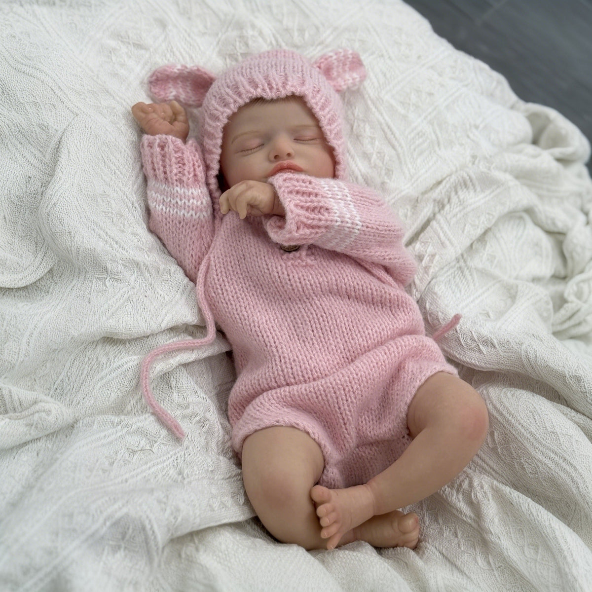 Bambola reborn Rosalie da 20 pollici dipinta in 3D bambina con vestiti rosa lavorati a maglia