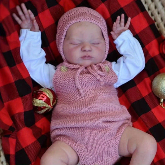 Bambola reborn Laura da 50 cm con corpo morbido e addormentato in maglione rosa