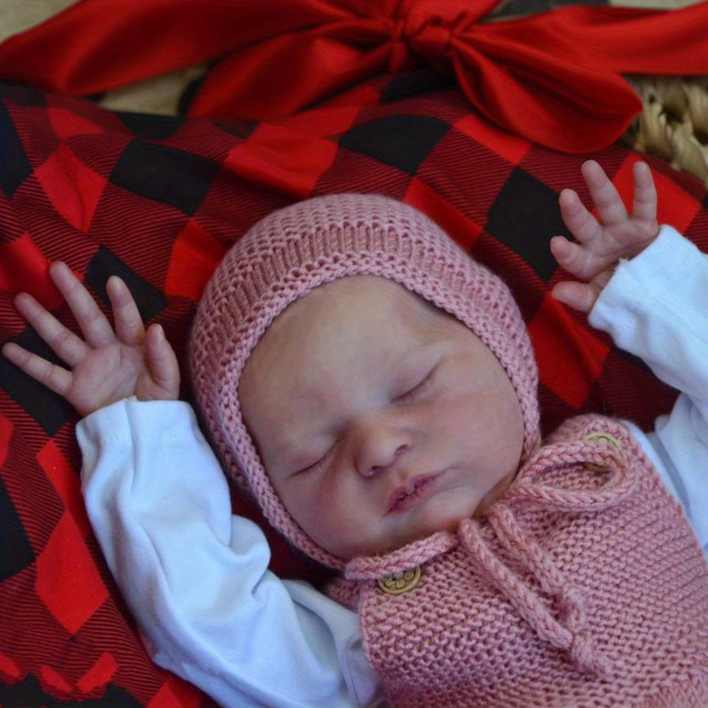Bambola reborn Laura da 50 cm con corpo morbido e addormentato in maglione rosa