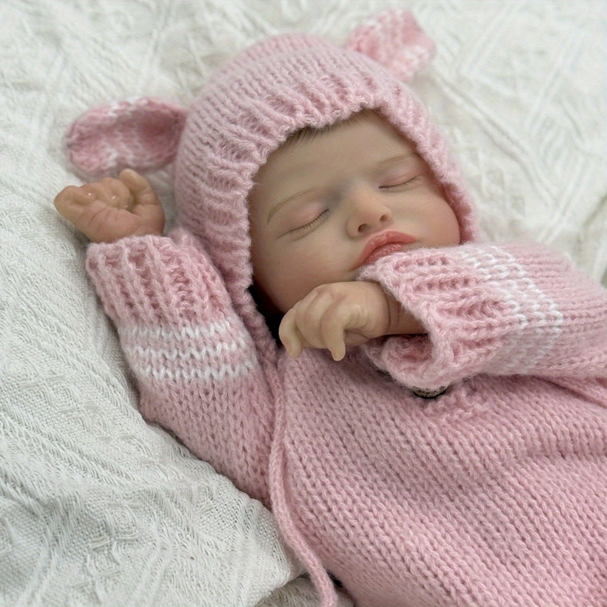 Bambola reborn Rosalie da 20 pollici dipinta in 3D bambina con vestiti rosa lavorati a maglia