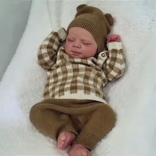Bambola Reborn Pascale da 48 cm con corpo morbido e addormentato